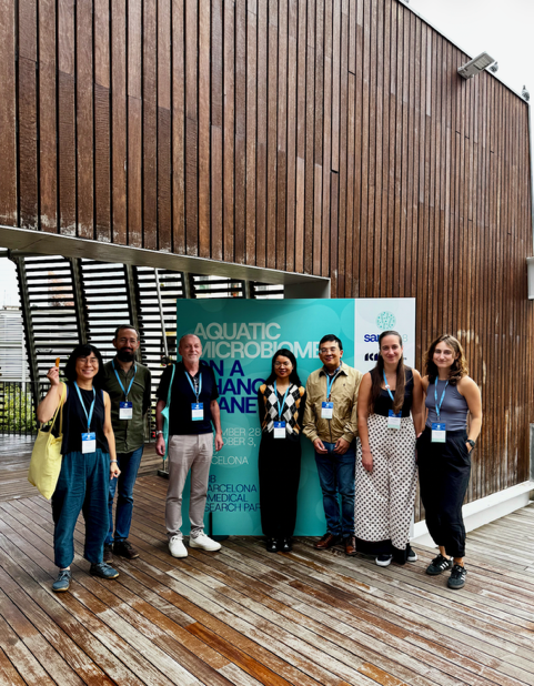 The picture shows a group of Microbial Oceanography Lab members at the SAME18.